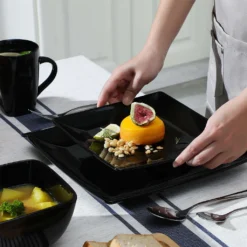 Vancasso Tafelservice »SOHO« 16-tlg. Porzellan Teller Set, Kombiservice Tafelset Mit Kaffeetassen, Müslischalen, Schwarz -Küchenbedarf Laden f41fcc1da29a1a916ab12df182c42ce8